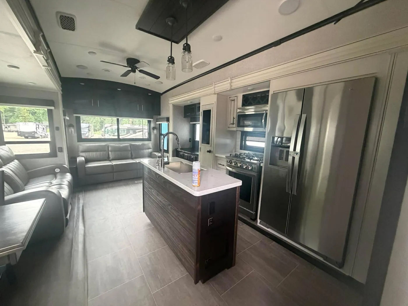 RV kitchen cleaned: stainless steel and counters spotless